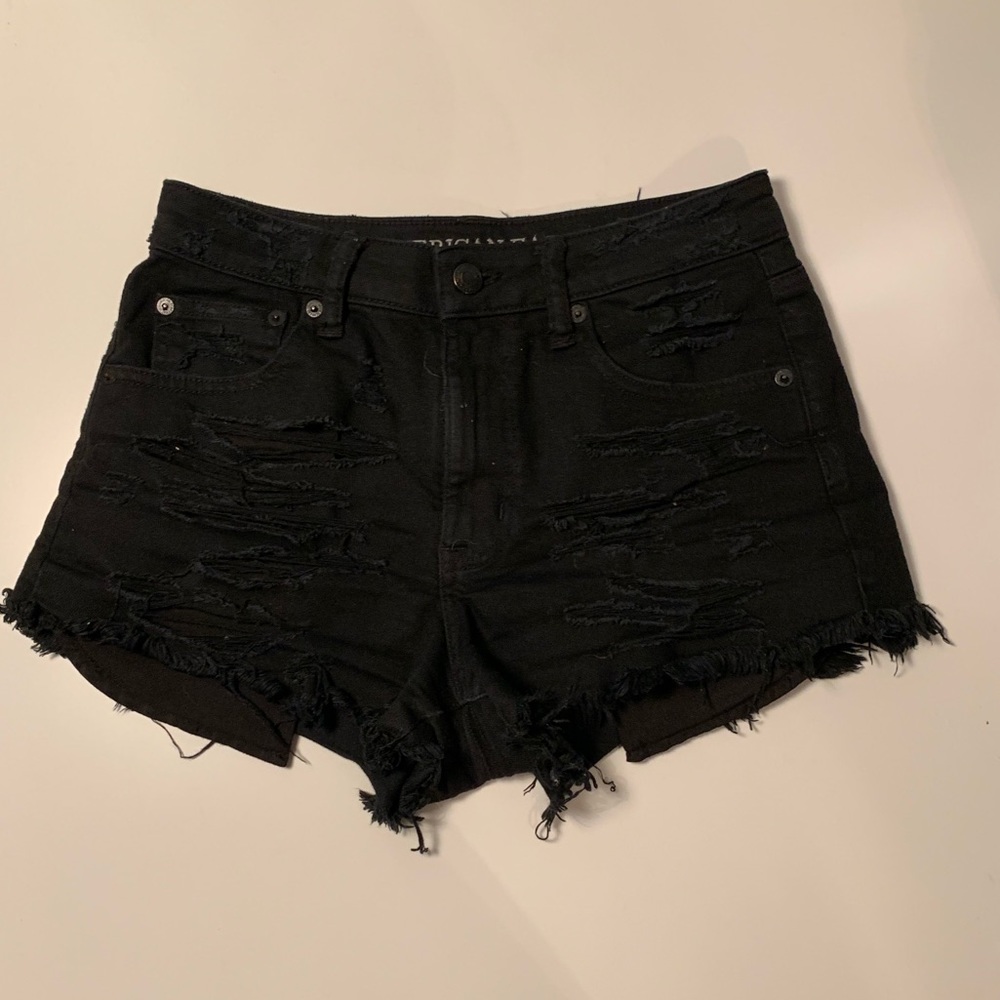 Black ripped shorts